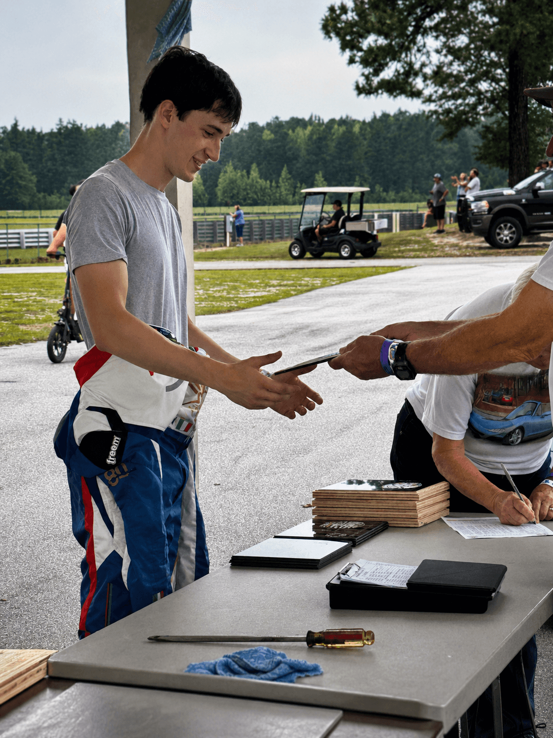 Award handoff during Filippo Massa's CMP 2026 race weekend
